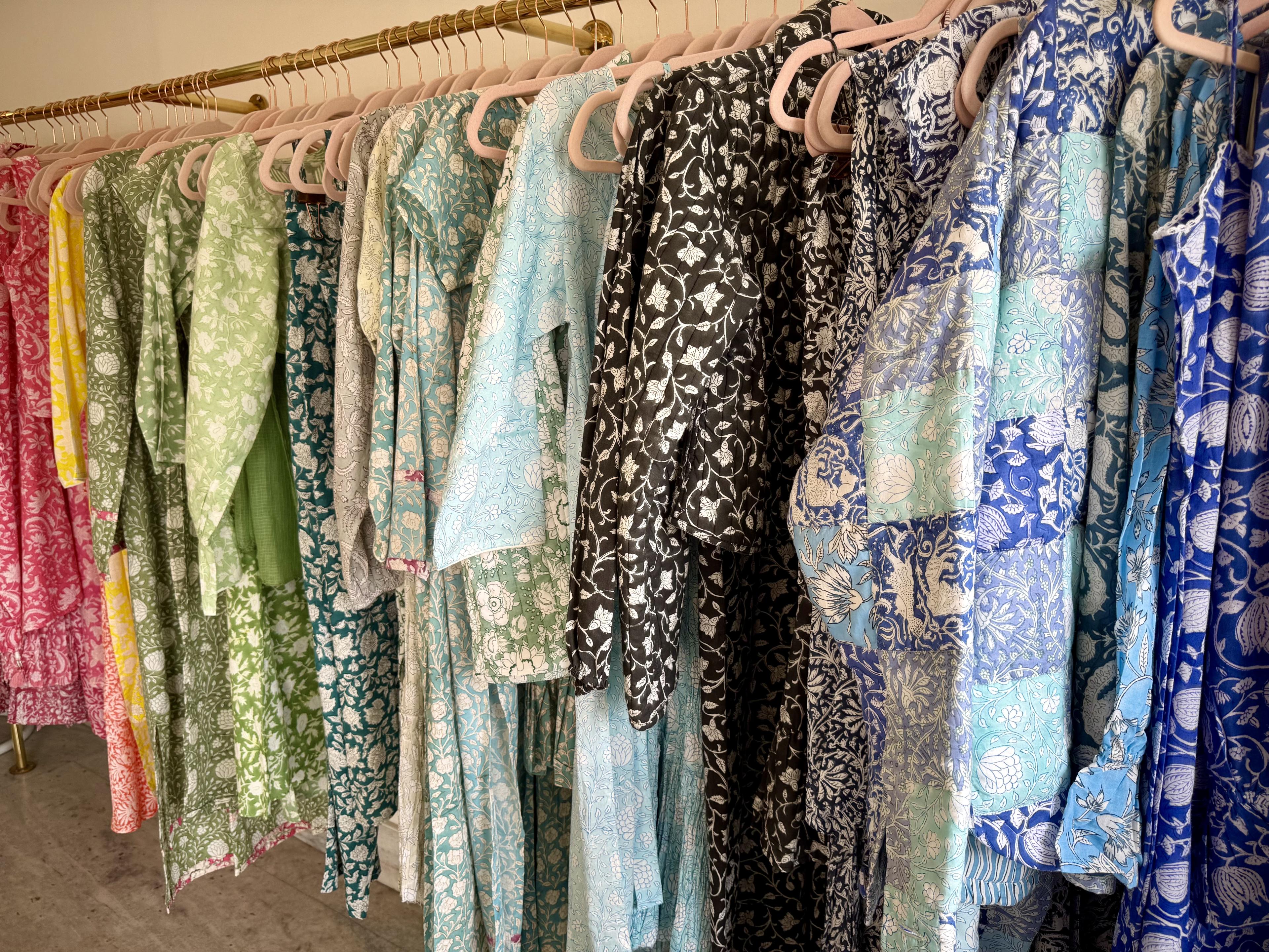 rack of colorful clothes
