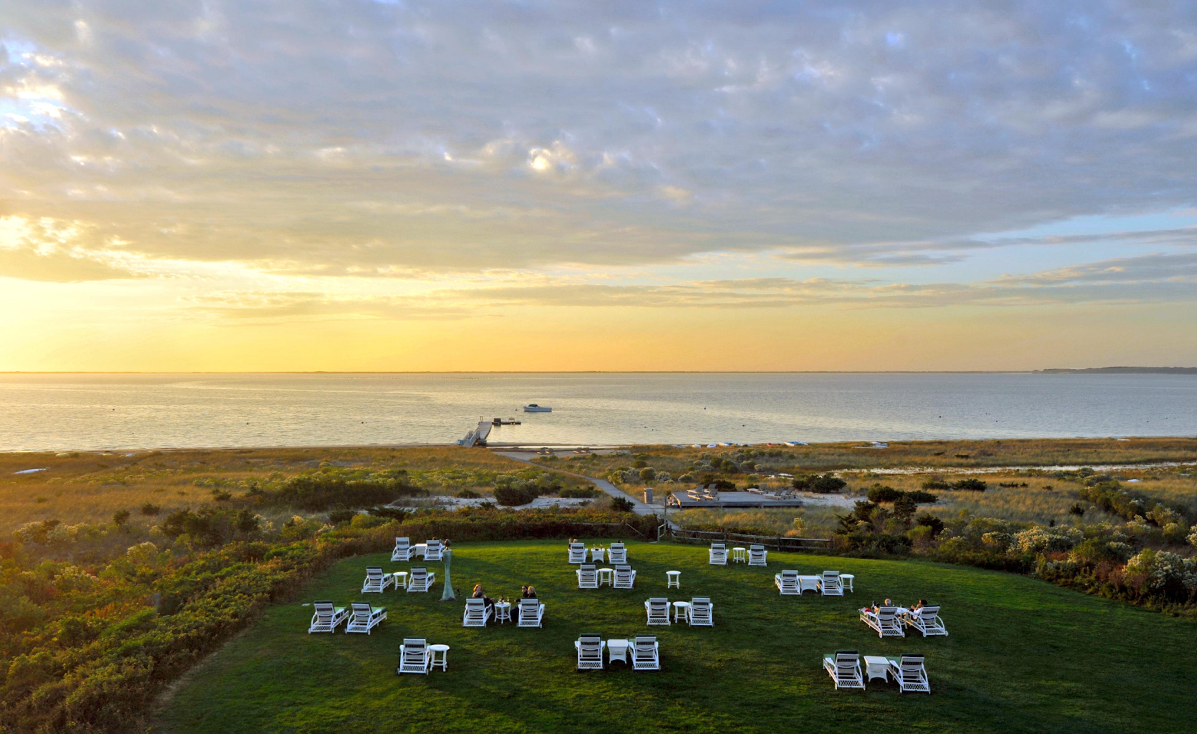 aerial view of chaise lounge chairs on a large lawn at Wauwinet Nantucket