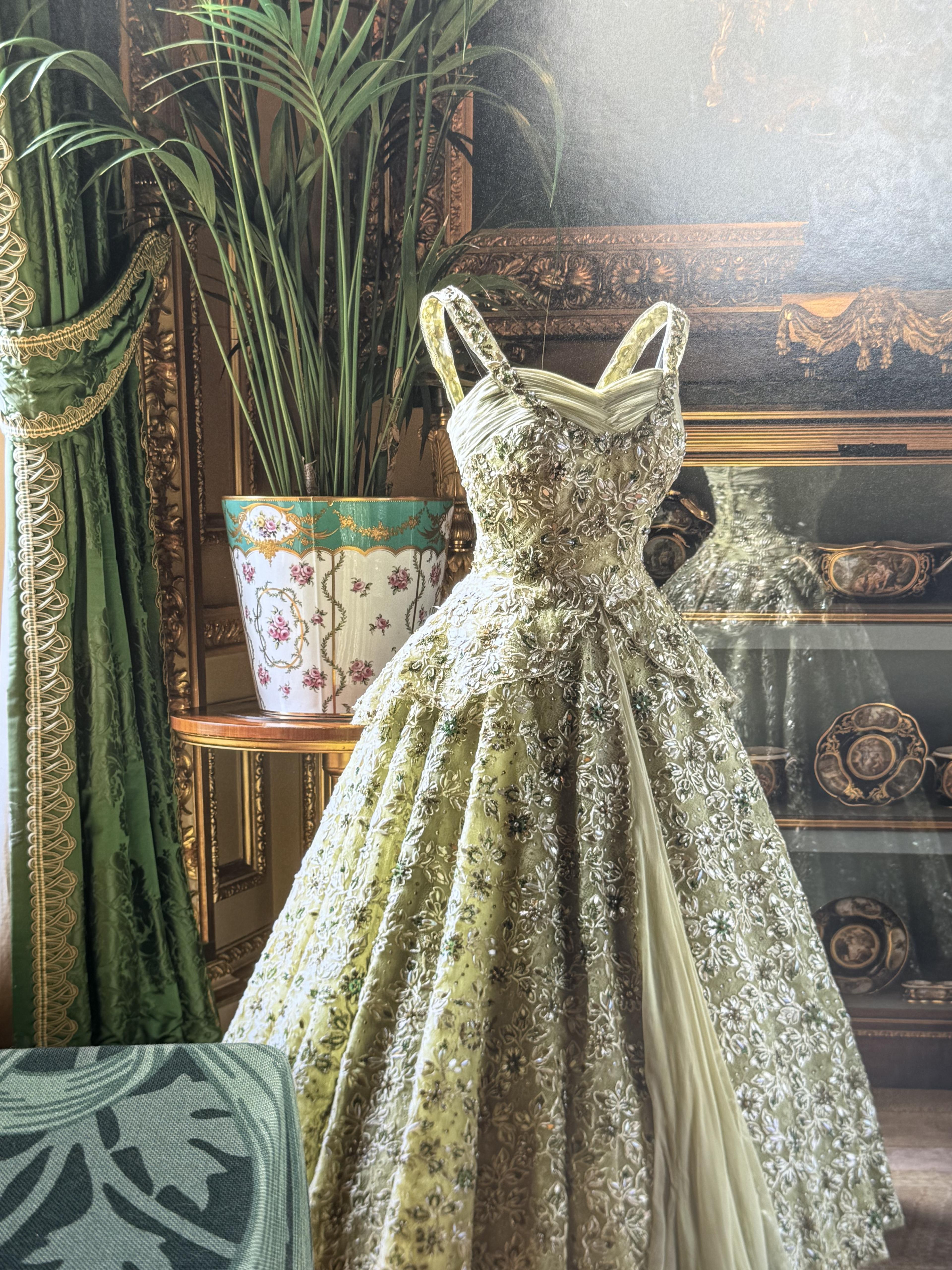 A gown displayed in “Queen Elizabeth II: Her Life in Style” at Buckingham Palace