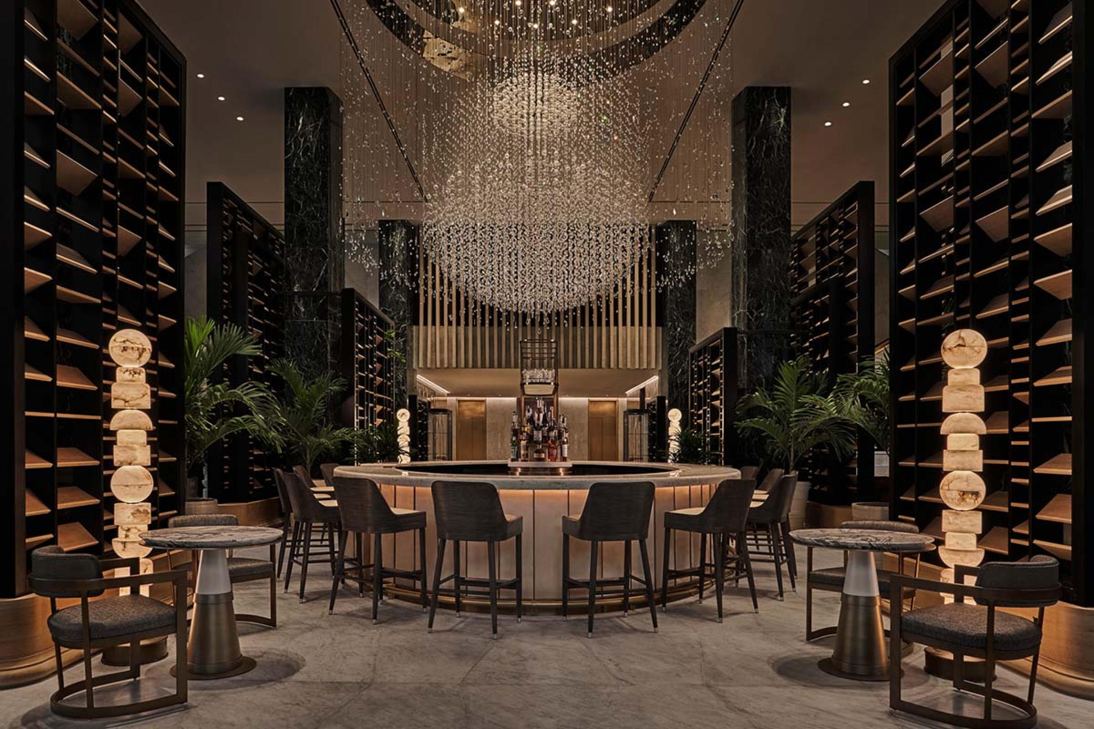 massive chandelier over a circular bar
