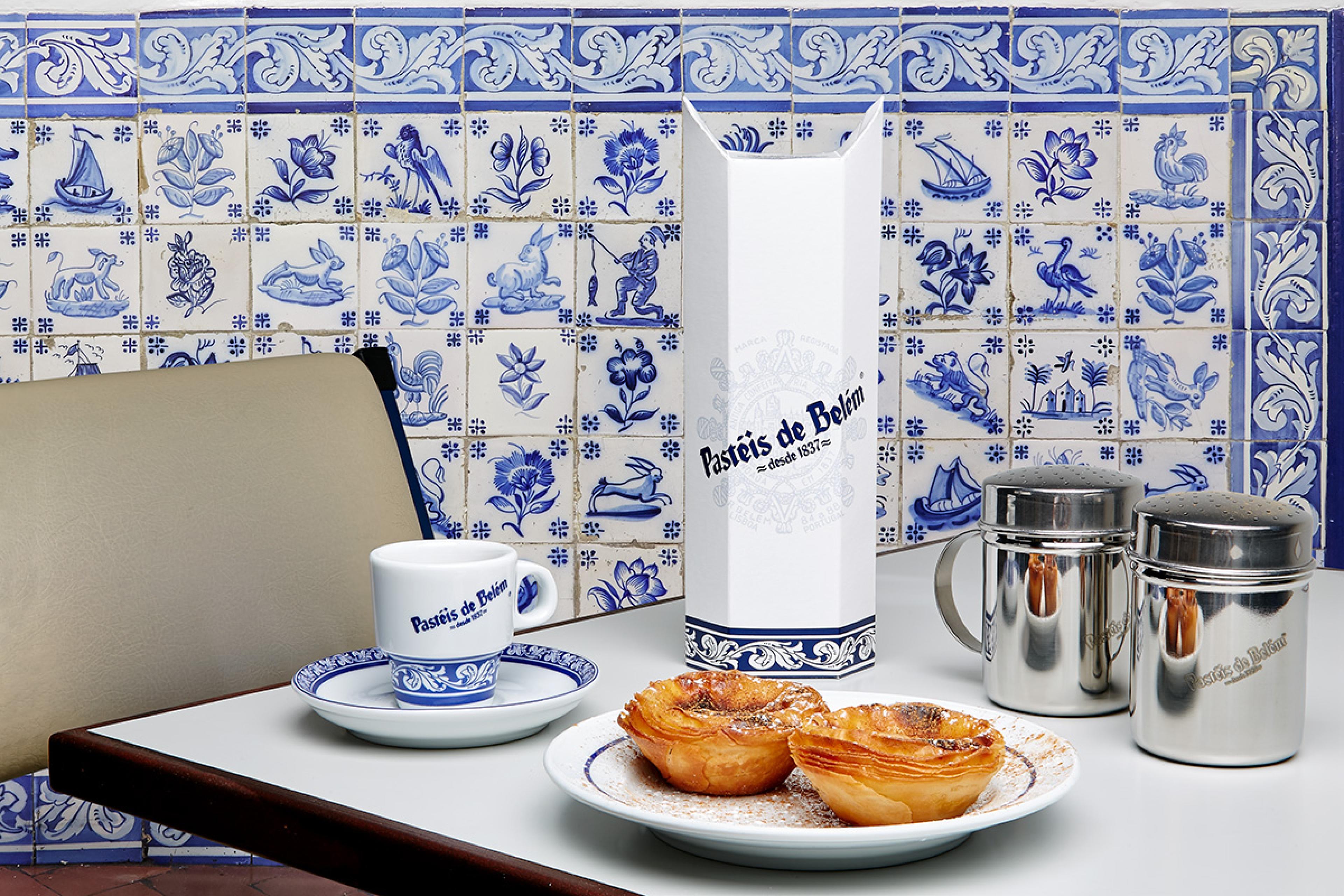 table with blue and white tiles behind it