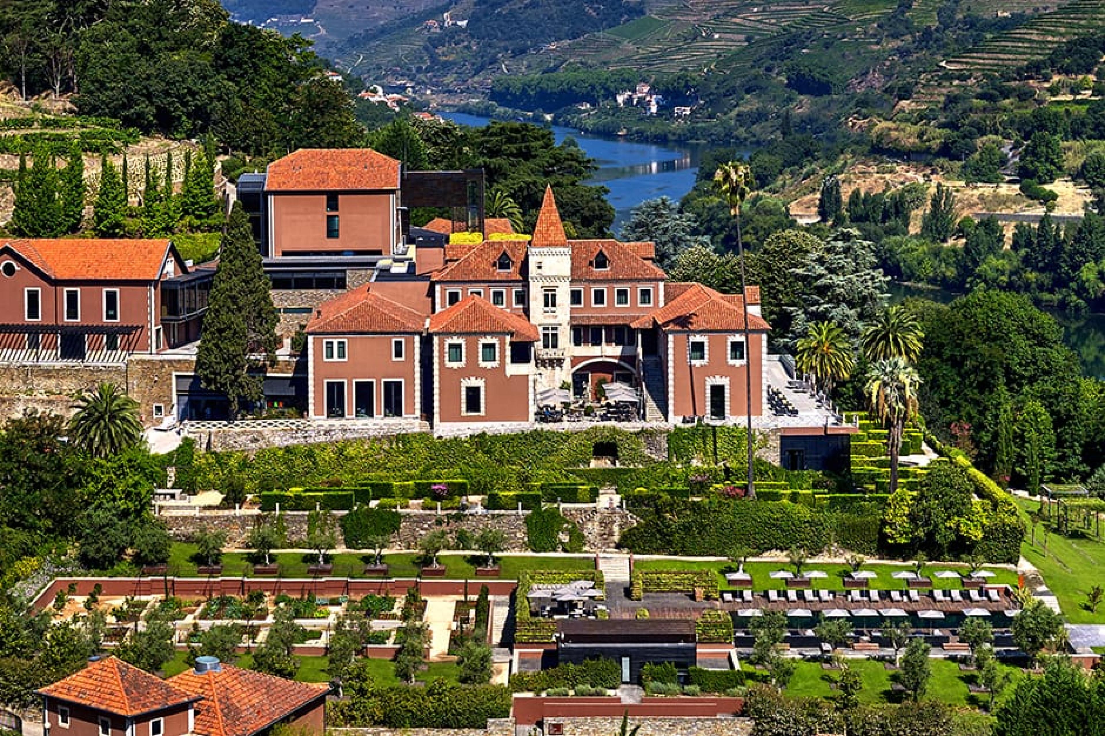 brick building with tower in vineyards