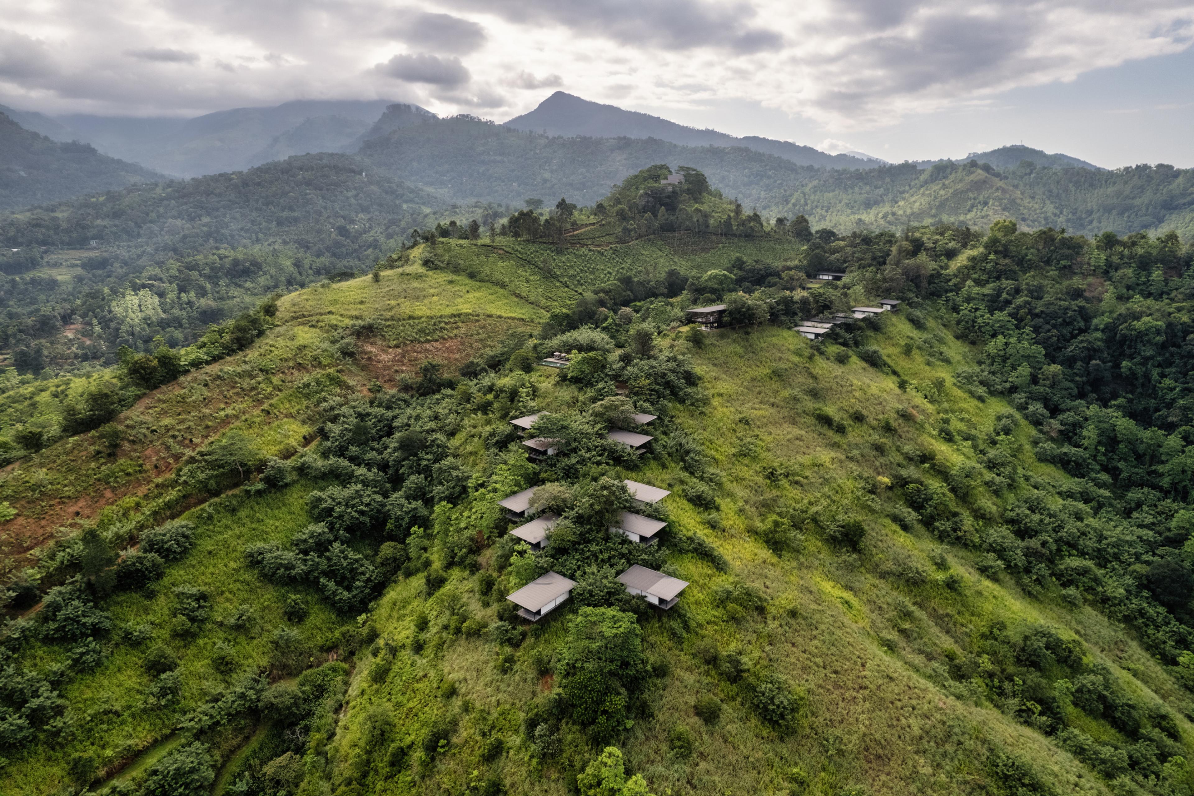 mountain villas on a green hillside