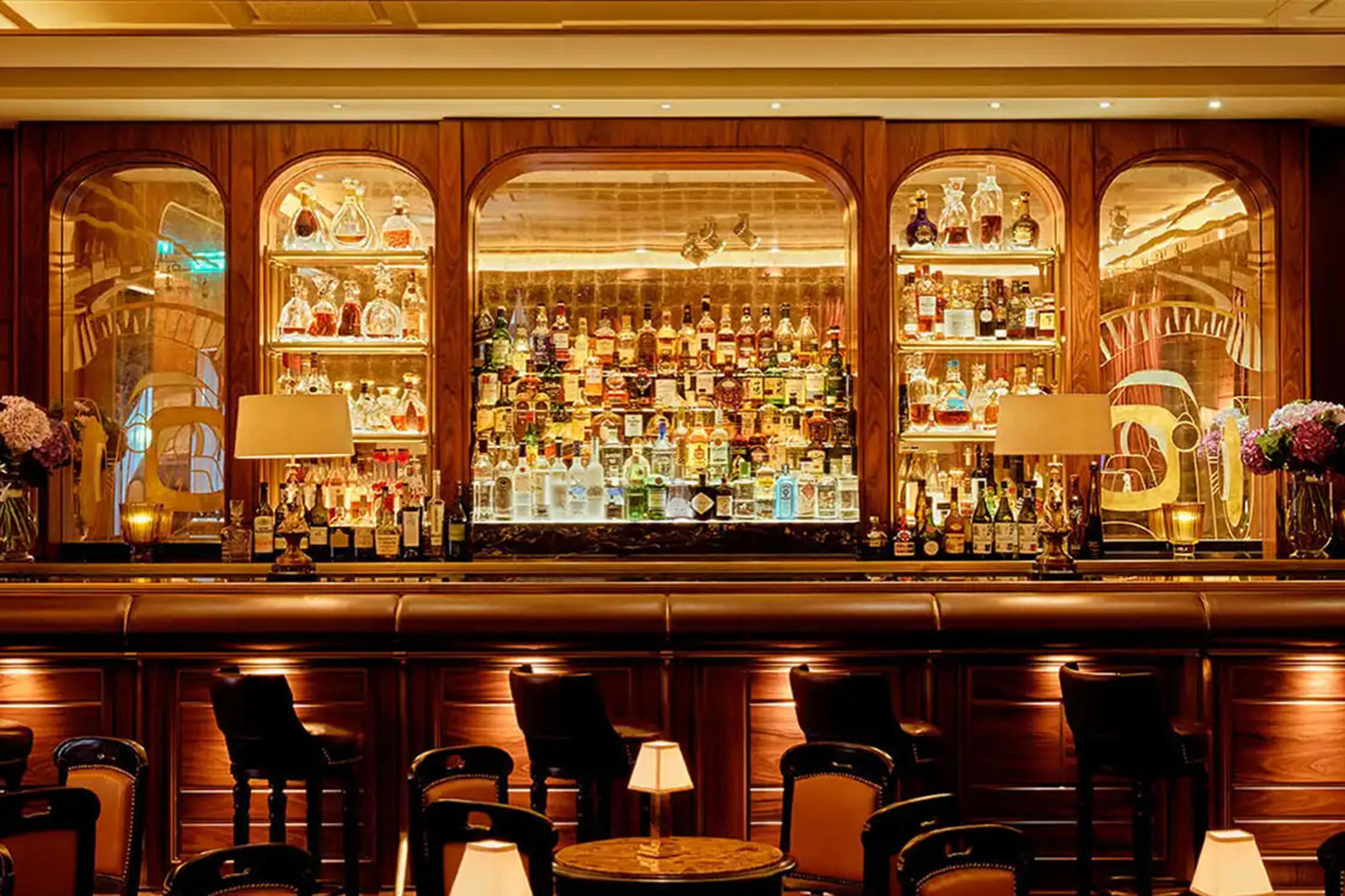 orange lit bar with leather stands