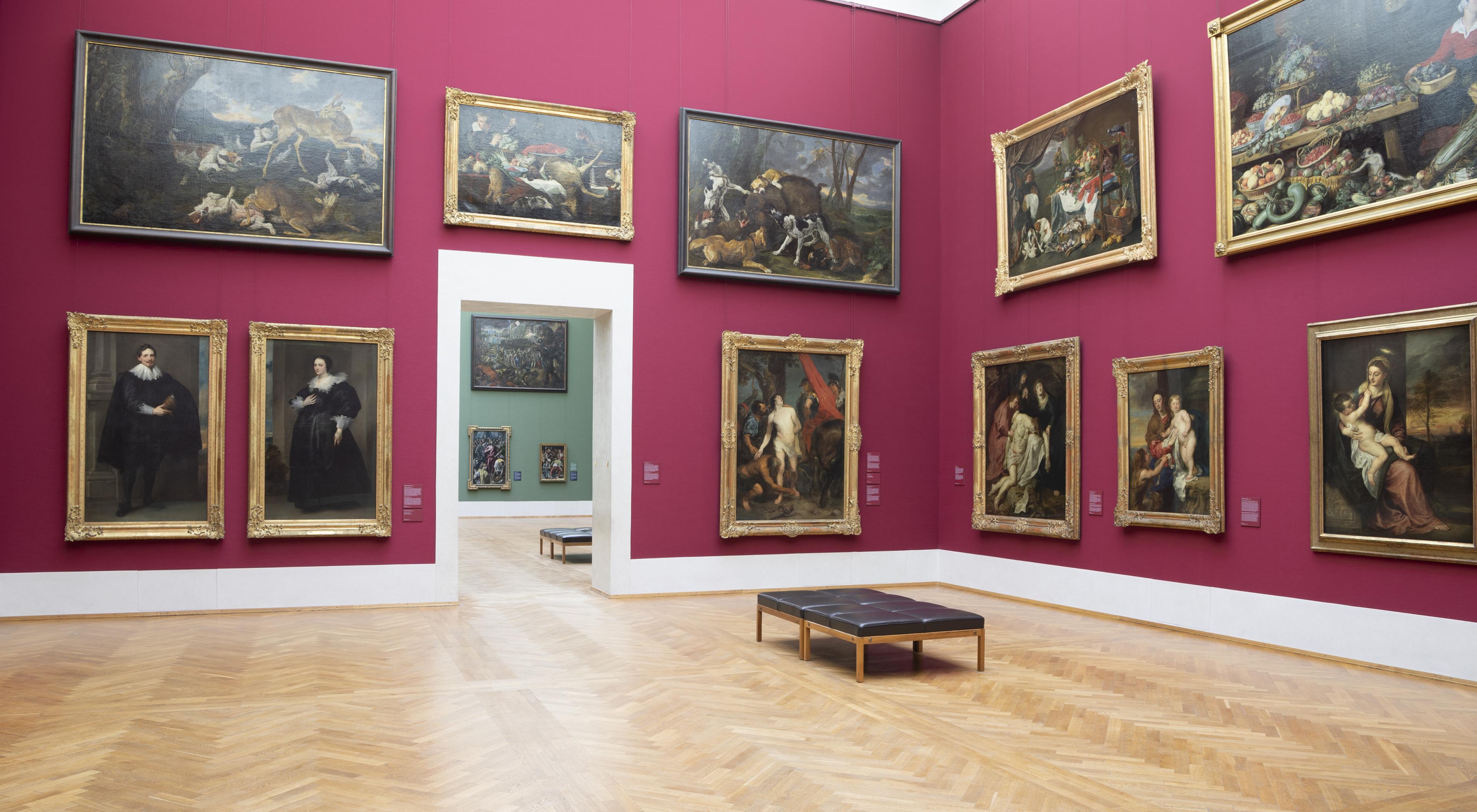 gallery hall in historic museum showing european paintings