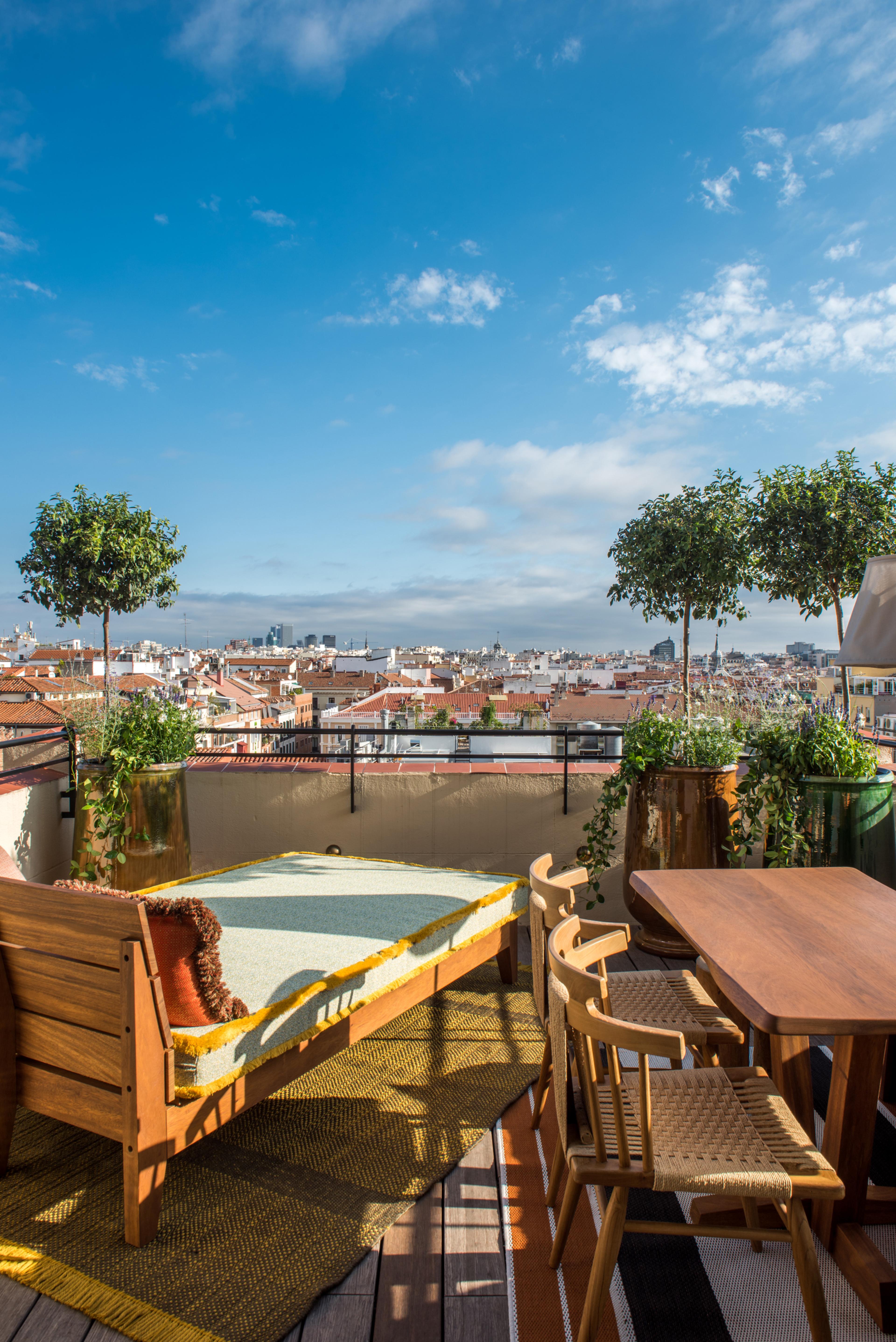 terrace with lounge chair overlooking Madrid